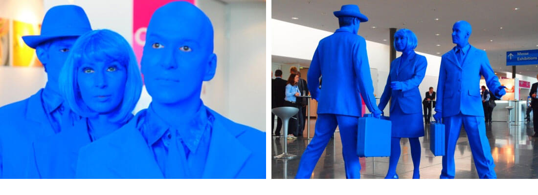 Die Blue Men agieren auf einer Abendveranstaltung bei ENBW