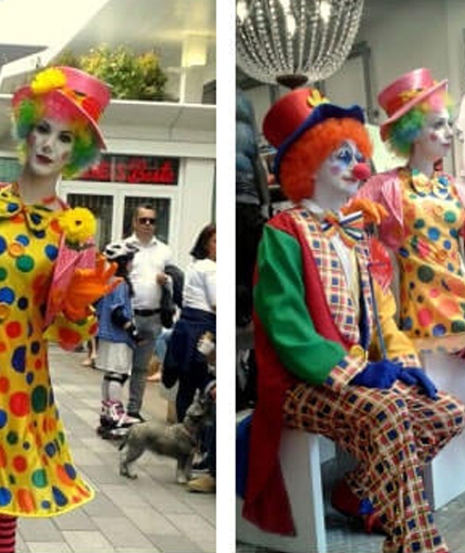 Living Clowns lebende Puppen bei einer Geschäftseröffnung