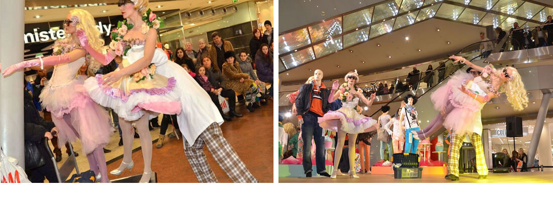 Die Living Dolls treten mit einem Dekorateur im ECE-Einkaufscenter auf