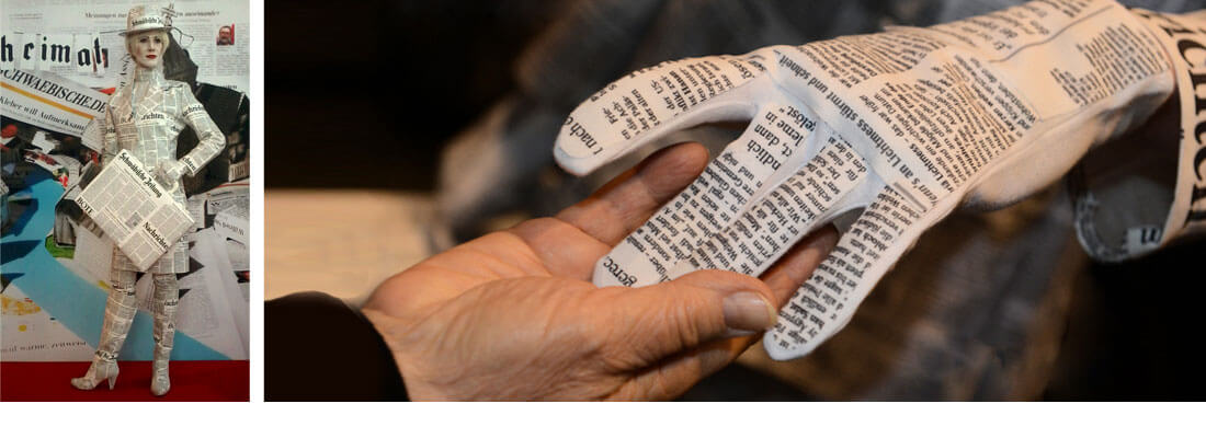 Ein Livingdoll Mädchen begrüßt die Gäste im maßgeschneiderten Zeitungskostüm